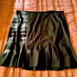 FIGURE FLATTERING pencil skirt that flares below the knee.